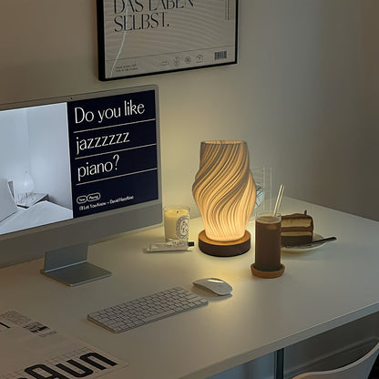 LED-Tischlampe im Wirbeldesign