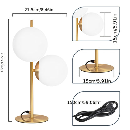 Goldene Tischlampe mit Glaskugel