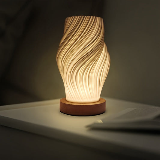 LED-Tischlampe im Wirbeldesign